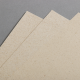 Dettaglio Carta Erba Naturale ecologica con texture ruvida e inclusioni naturali